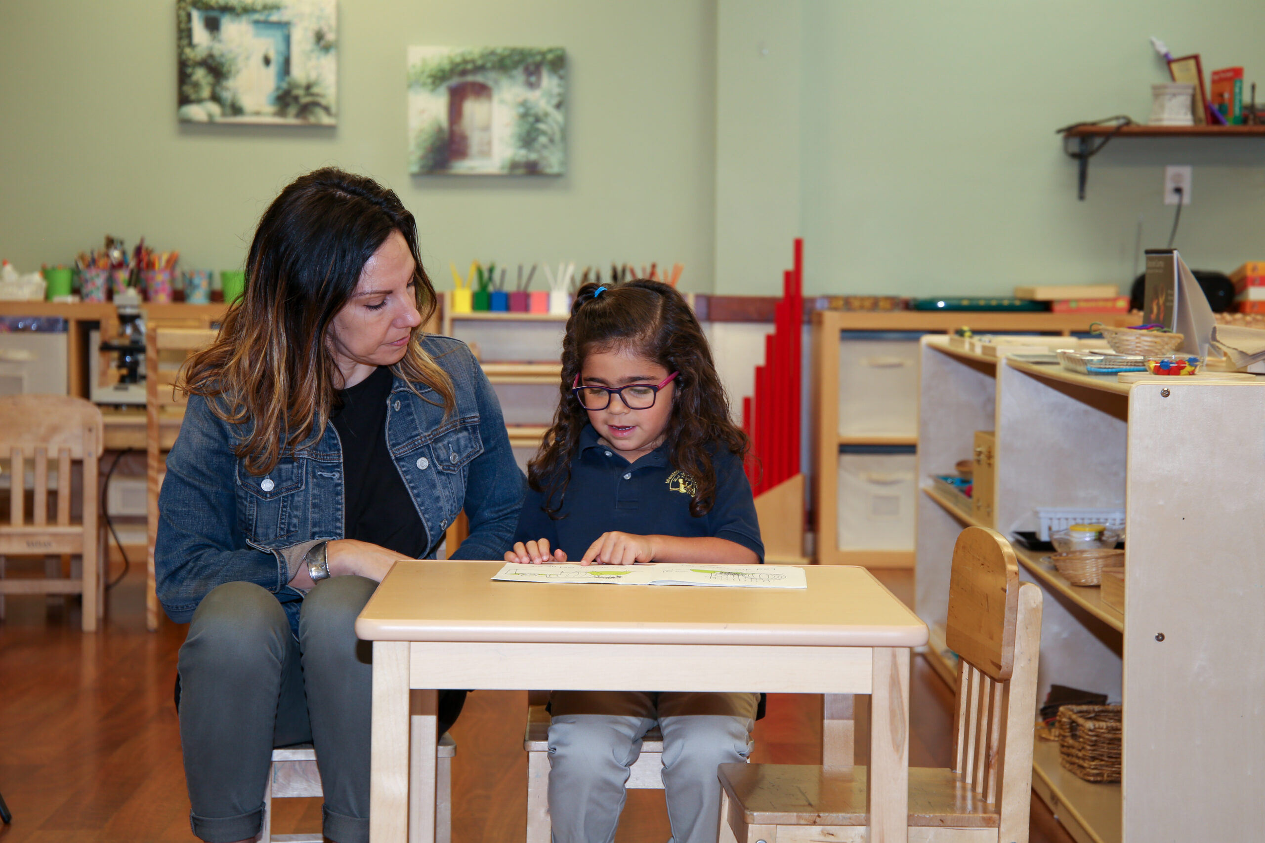 student with teacher