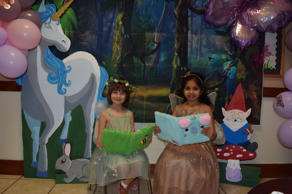 kids playing dress up reading storybooks