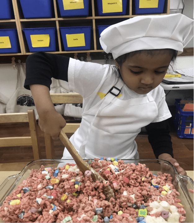 Kid Making Cereal