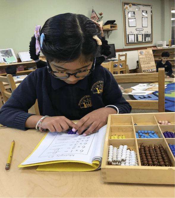 Kid doing multiplication
