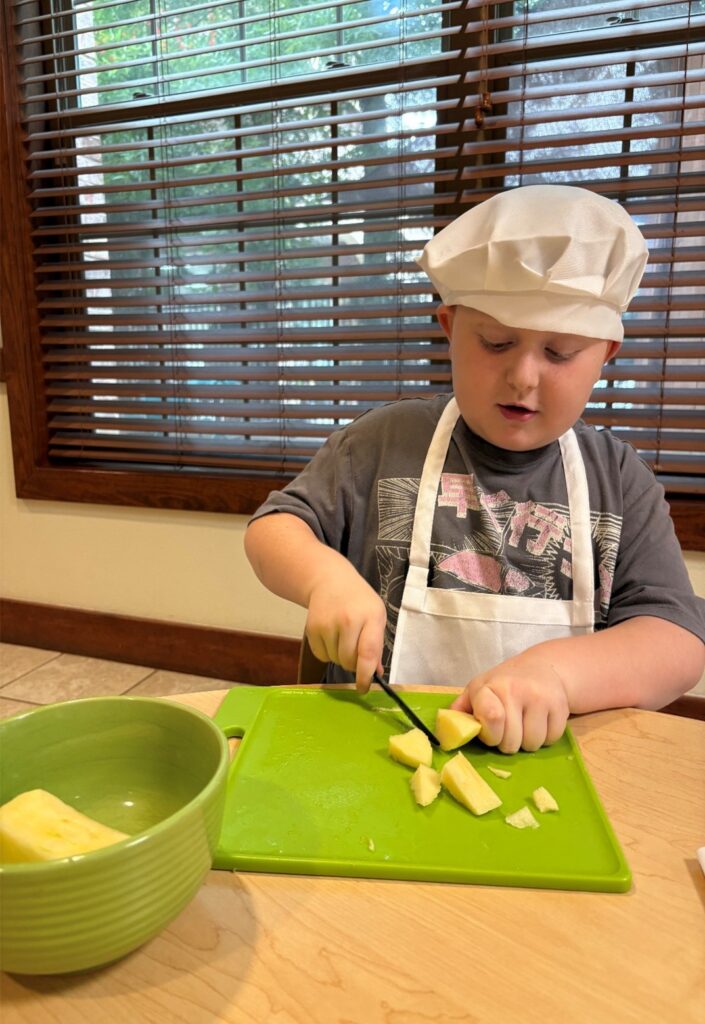 kid chopping food