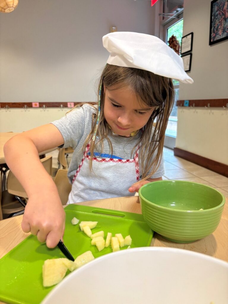kid cutting food